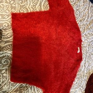 Boutique Red sweater. Picture with it on in profile picture. Size medium.